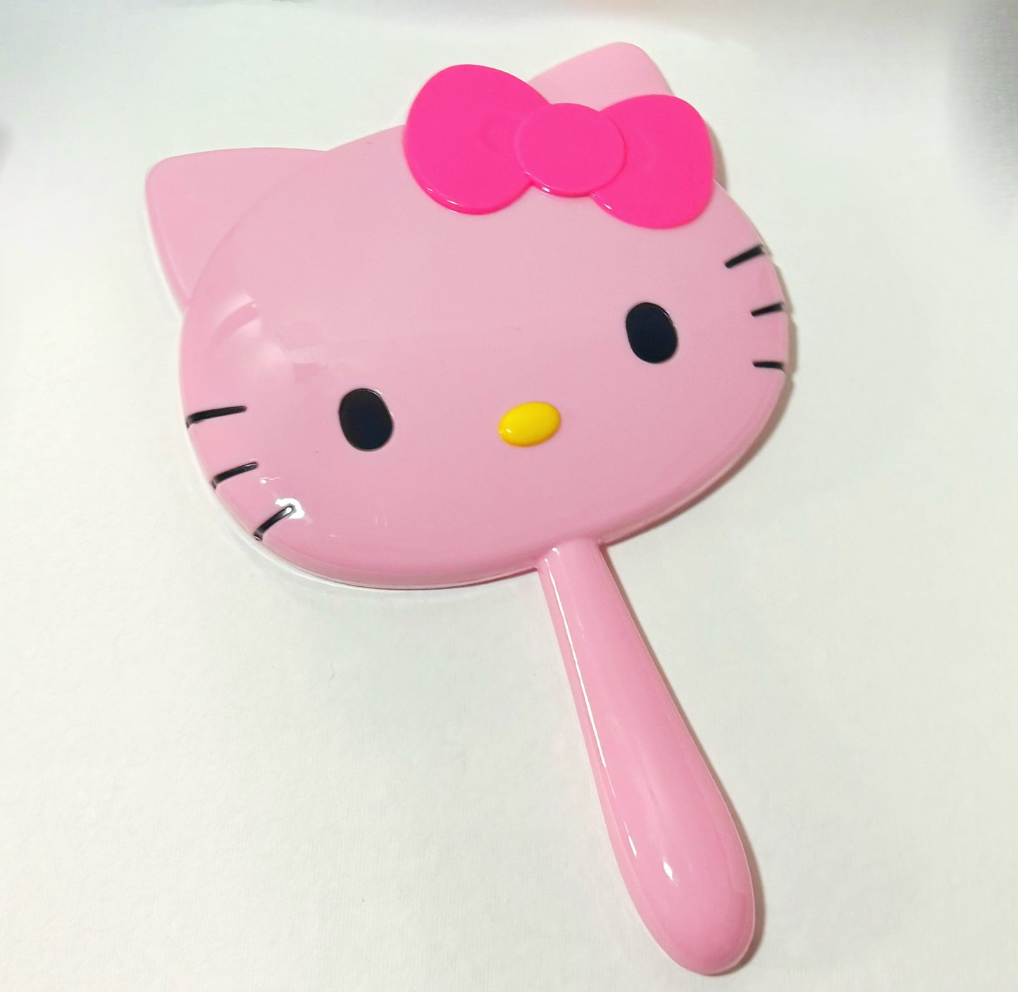 Hello kitty hand held mirror